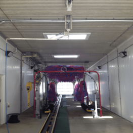 Car wash paneling in car wash bay