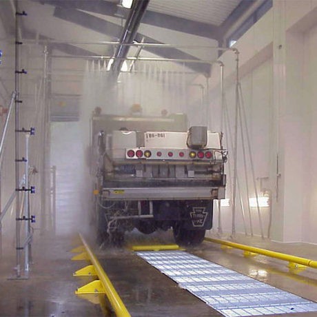Salt truck in an industrial wash tunnel