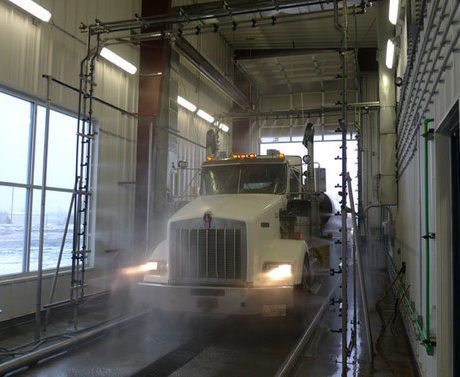 Truck wash in industrial wash tunnel